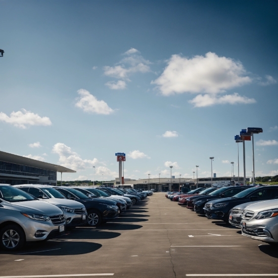 Cloud, Automotive Parking Light, Car, Sky, Land Vehicle, Wheel