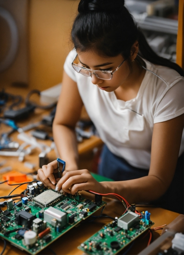 Hand, Yellow, Eyewear, Audio Equipment, Engineering, Circuit Component