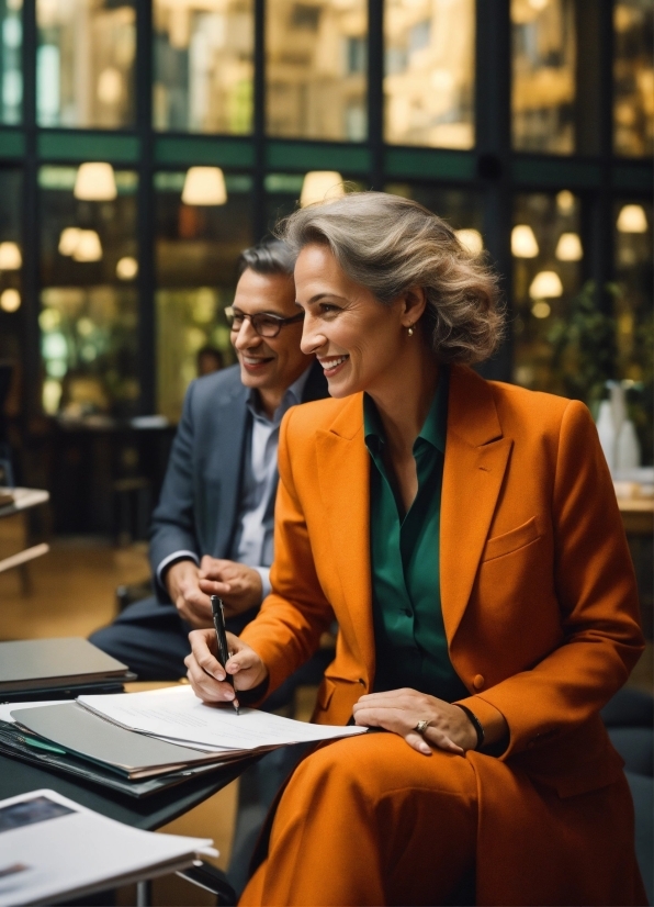 Smile, Hand, Coat, Interaction, Table, Eyewear