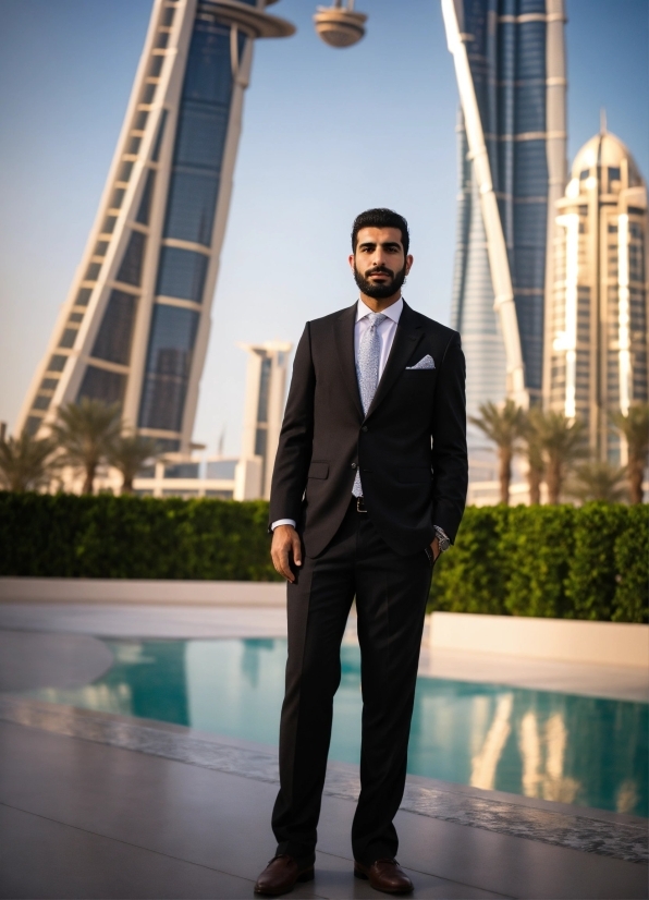 Sky, Building, Dress Shirt, Skyscraper, Infrastructure, Tower