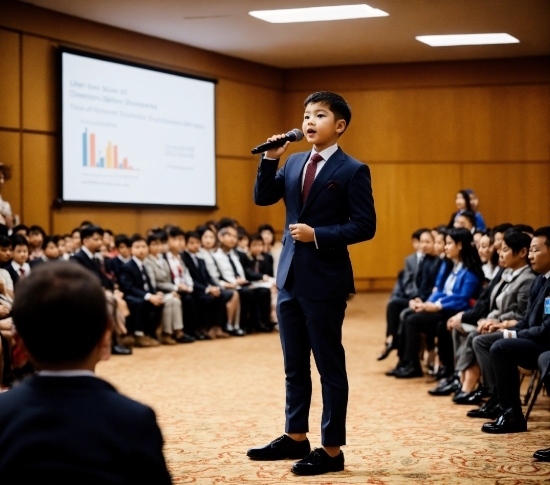 Microphone, Tie, Chair, Suit, Event, Spokesperson