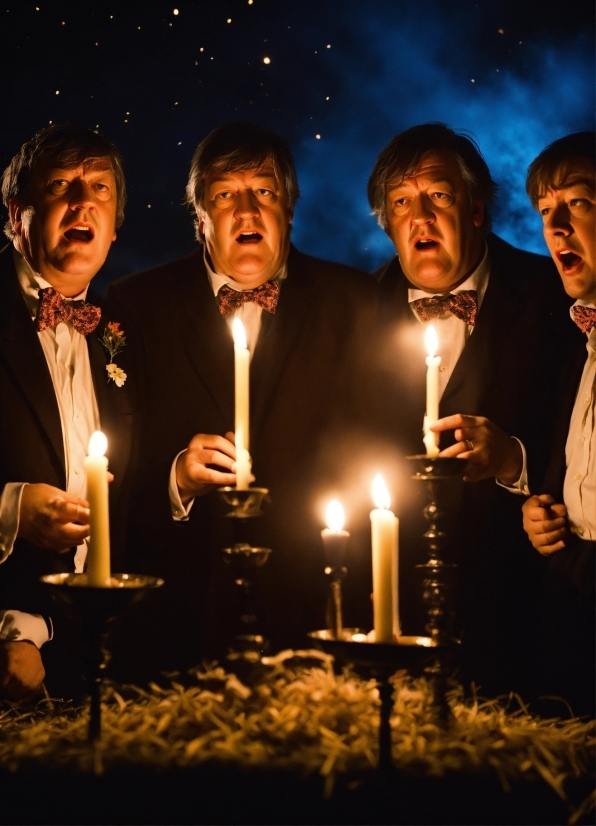 Face, Head, Candle, Lighting, Coat, Social Group