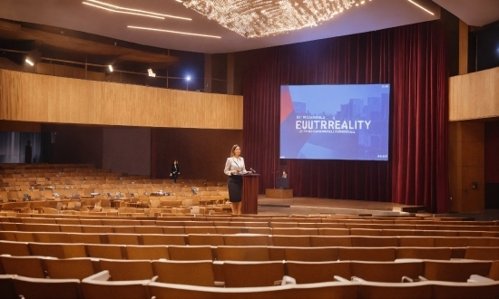 Clothing, Lighting, Chair, Podium, Hall, Curtain