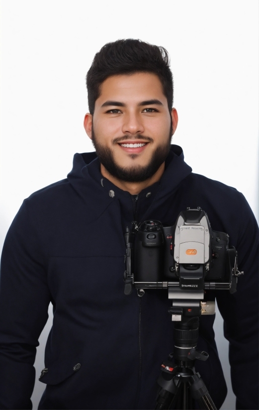 Smile, Outerwear, Beard, Flash Photography, Sleeve, Photographer