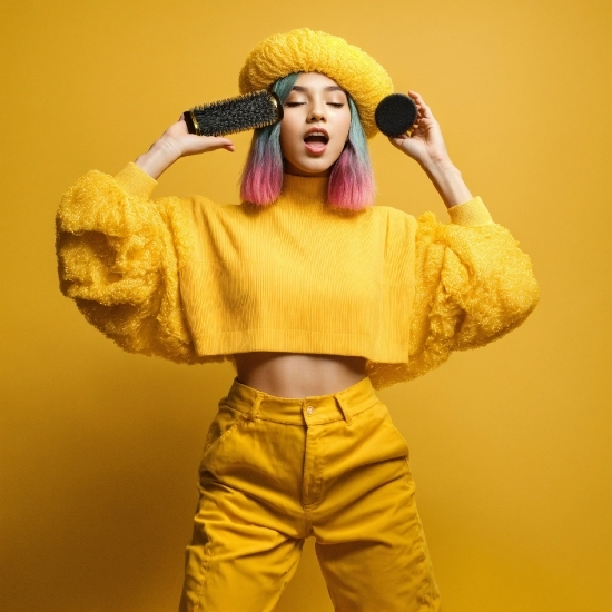 Sleeve, Gesture, Yellow, Headgear, Entertainment, Performing Arts