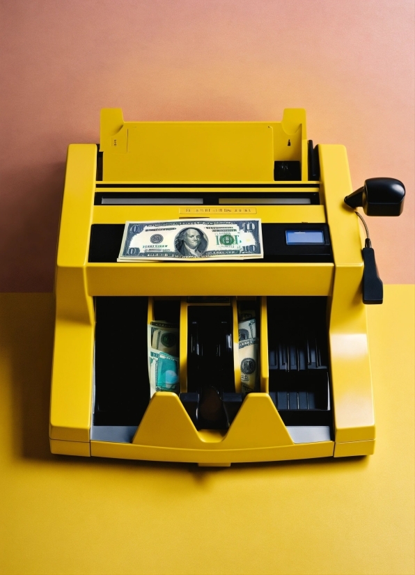 Yellow, Toy, Rectangle, Font, Machine, Art