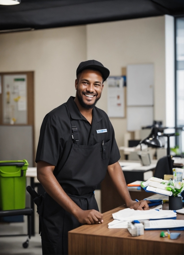 Smile, Table, Sleeve, Workwear, Hat, Engineering