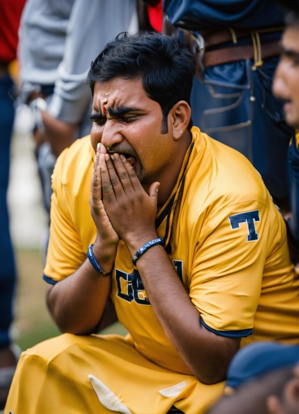 Forehead, Temple, Yellow, Adaptation, Elbow, Event