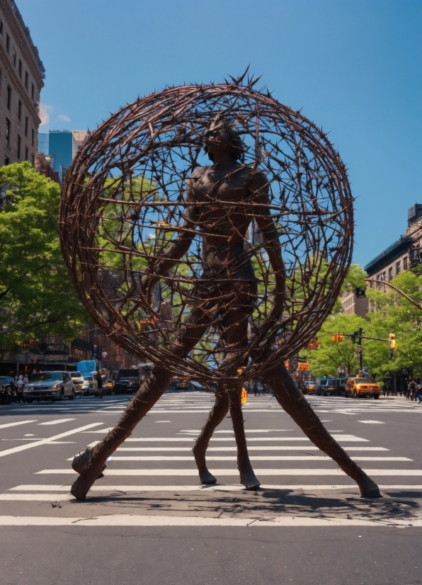 Sky, Plant, Tree, Infrastructure, Sculpture, Wheel