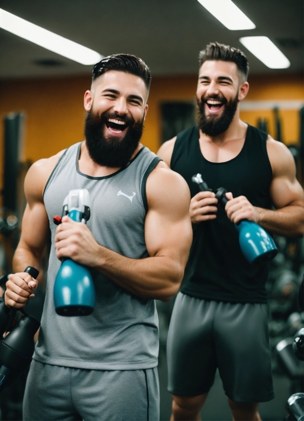 Face, Smile, Arm, Shorts, Muscle, Vest